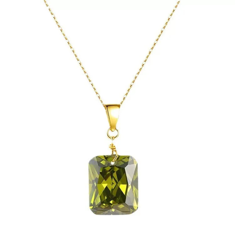Gold chain necklace with rectangular green gemstone pendant, demi-fine jewelry