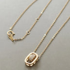 18K gold plated necklace with geometric pendant and sparkling cubic zirconia details