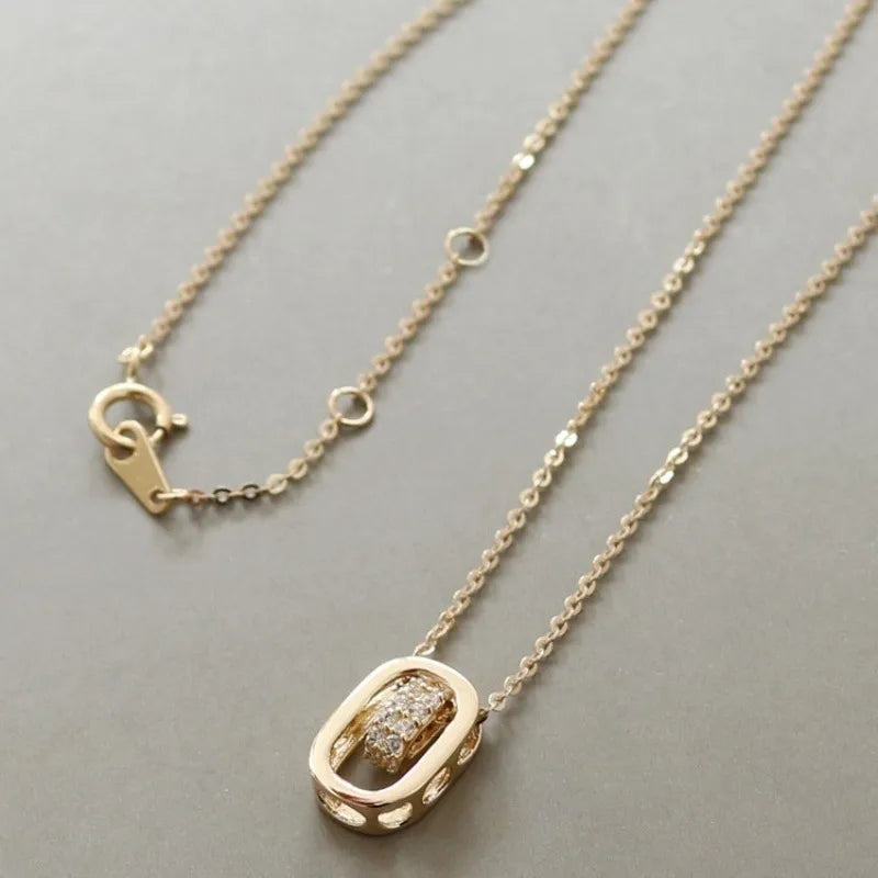 18K gold plated necklace with geometric pendant and sparkling cubic zirconia details