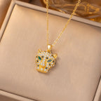 Gold-plated leopard pendant necklace with crystal accents on a delicate chain